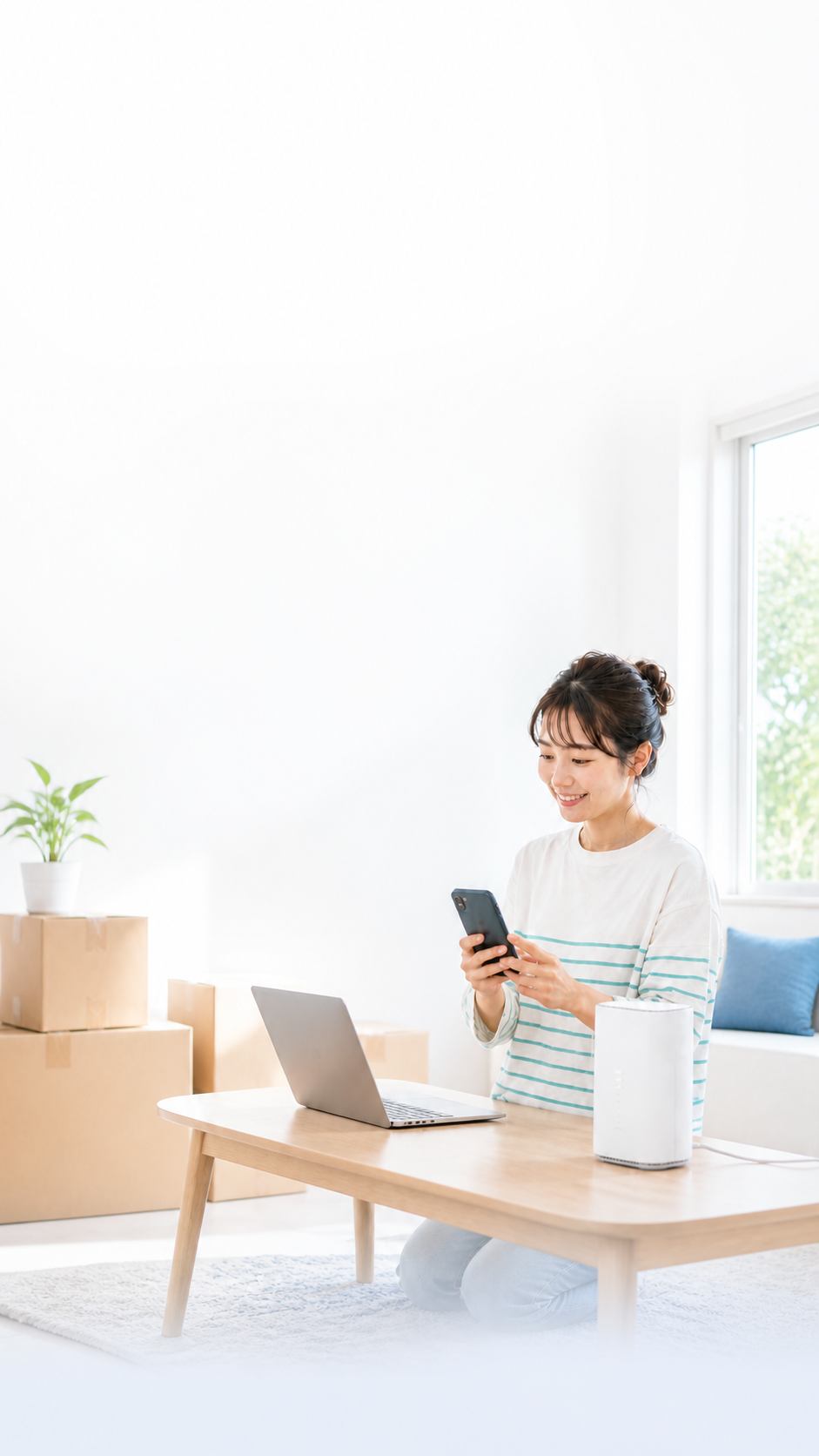 引越し先でインターネット回線を確認する女性とルーター